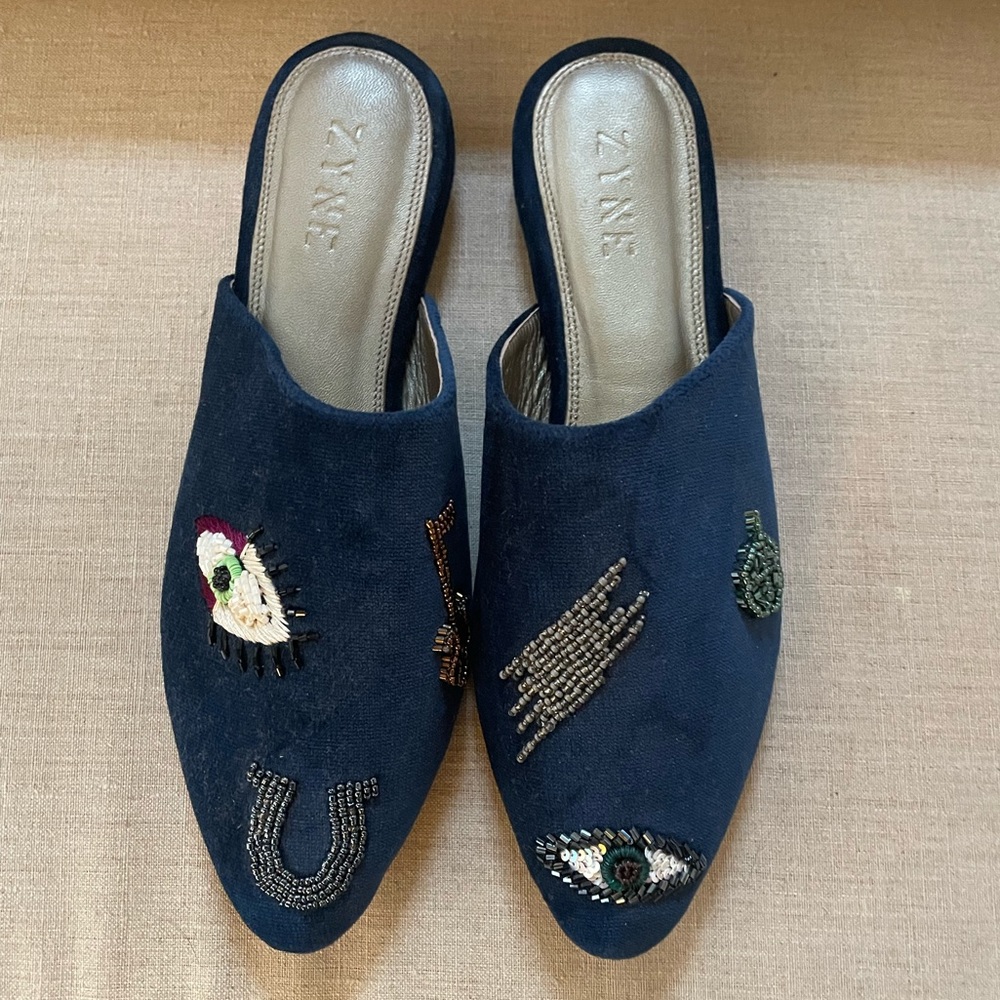 Zyne Blue Velvet Mules with sequin details.